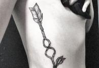 “Bultiņa”: tetovējuma nozīme, iezīmes, fotoattēls